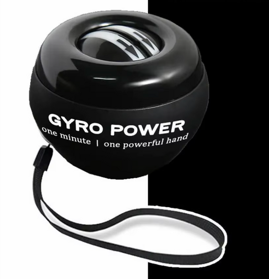 Close-up view of a Black Gyro Powerball with an exposed internal gyroscope