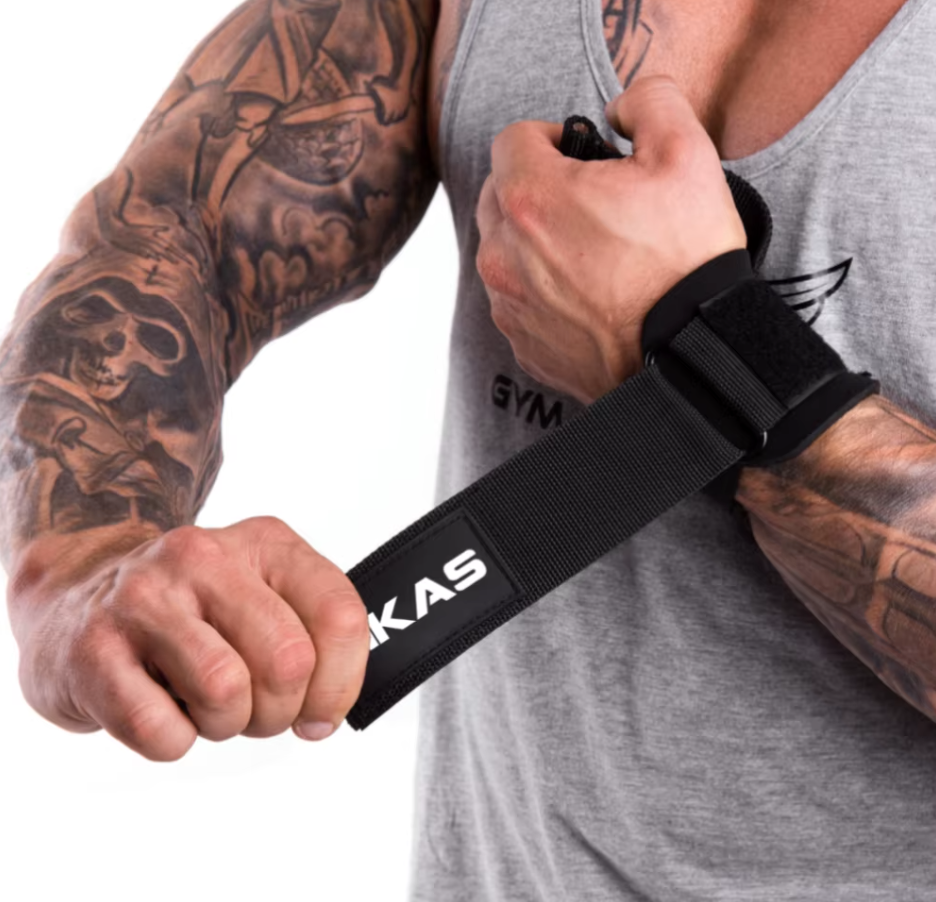Man Fastening Black weightlifting power grip gym straps for better grip and wrist support during heavy lifts