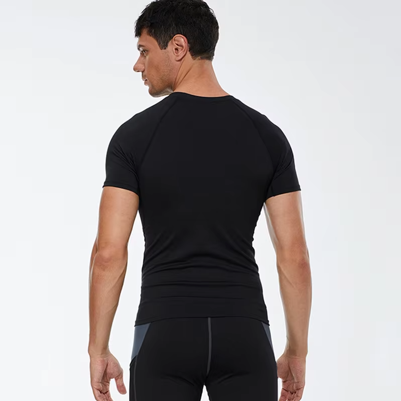 Man showing the back of the athletic quick dry gym and fitness t shirt