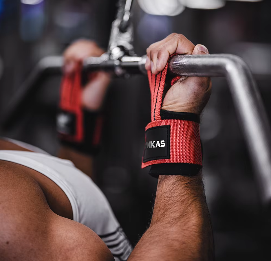 Red weightlifting straps with a non-slip grip for deadlifts, rows, and pull exercises