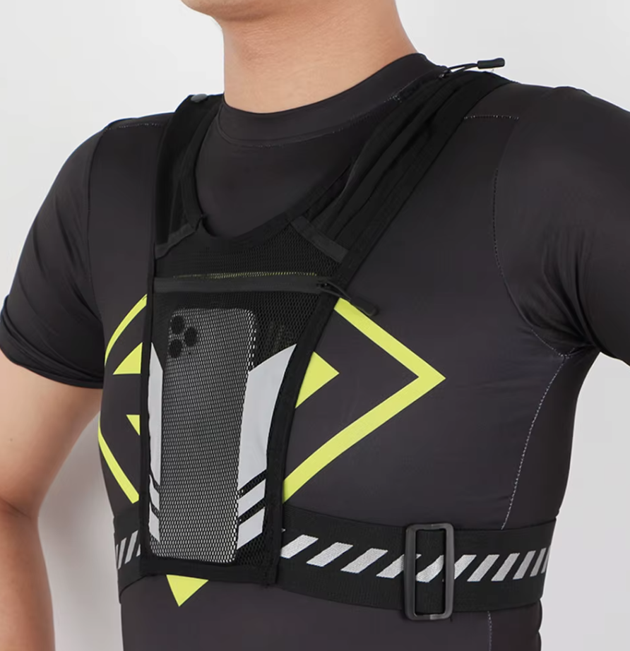 Model showing front phone pocket of the reflective and adjustable running vest